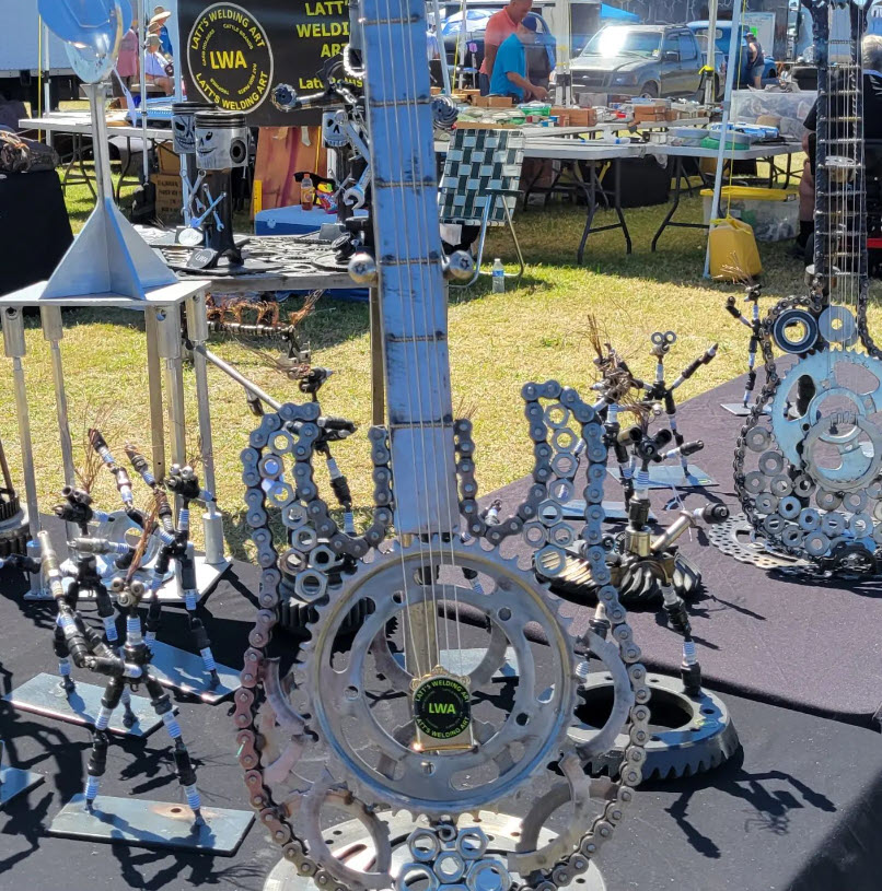 assorted welded art creations on display