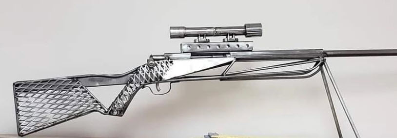 welded metal rifle