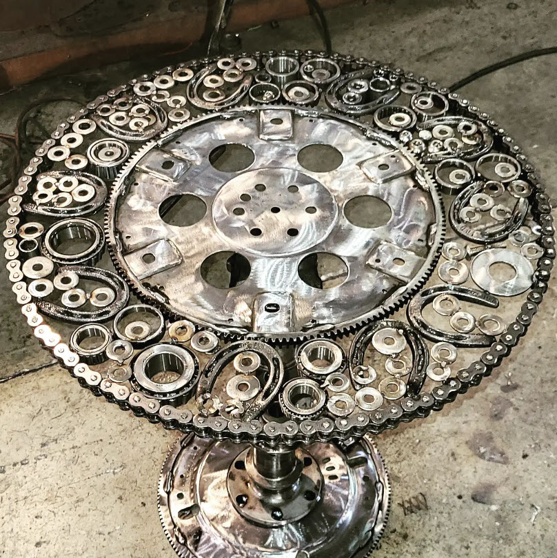 elaborate welded art table
